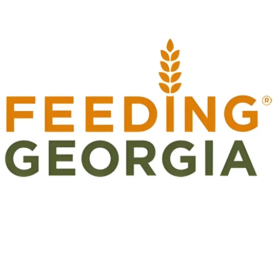 Feeding Georgia logo with the word “FEEDING” in orange, “GEORGIA” in green, and an orange wheat symbol replacing the “I” in “FEEDING” on a white background.
